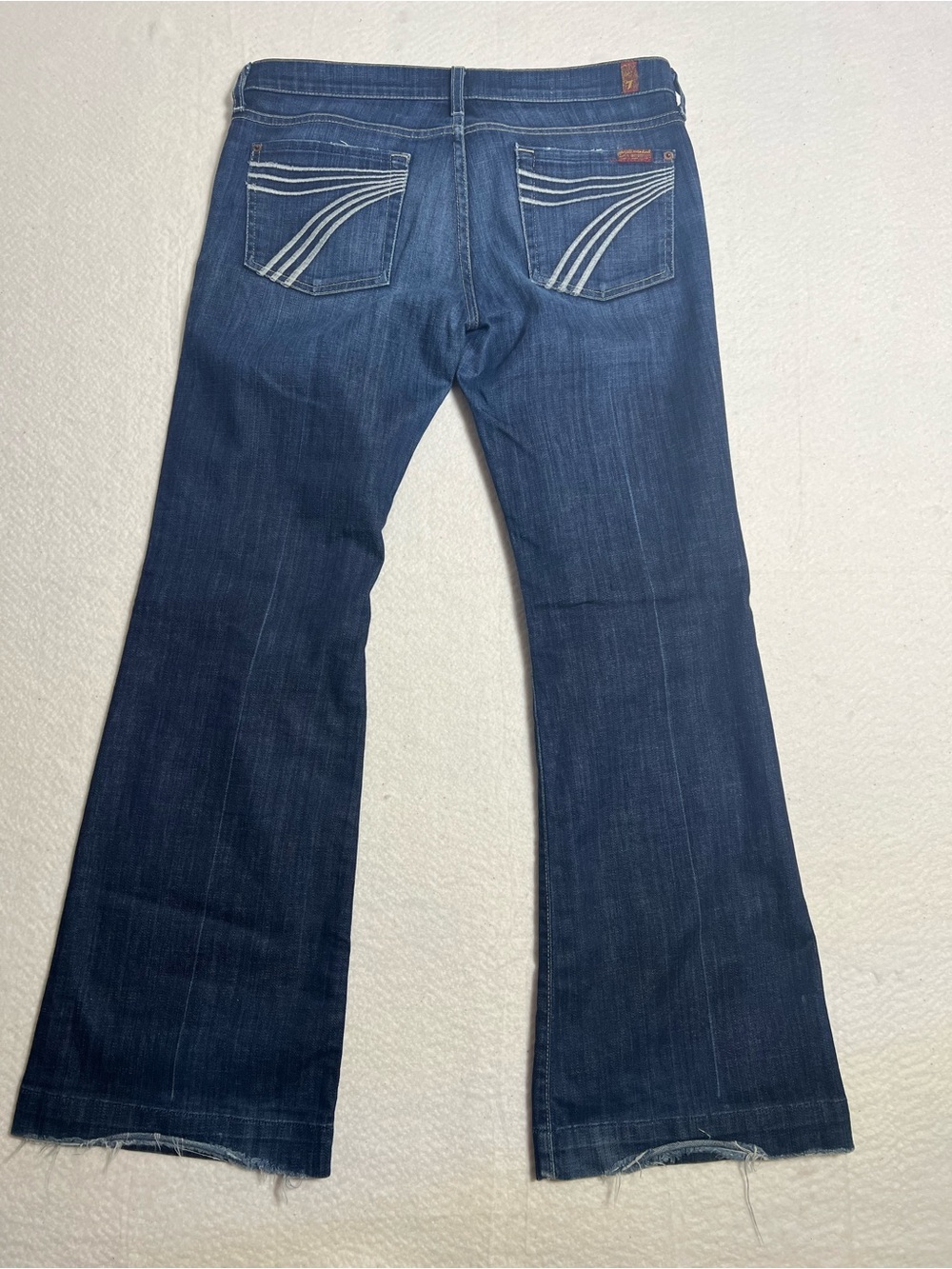 7 For All Mankind Dark Blue Dojo Flare Jeans with Signature Pocket Stitching